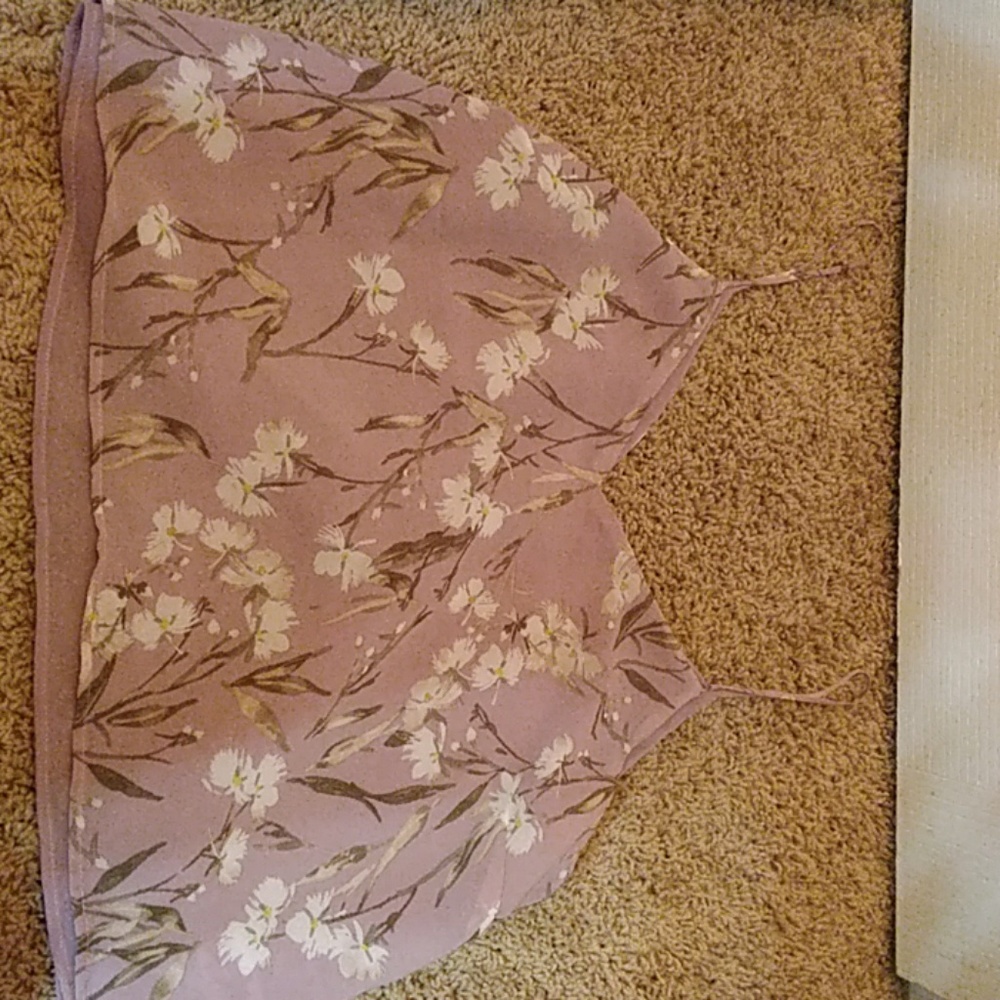 A cropped flowy tank top